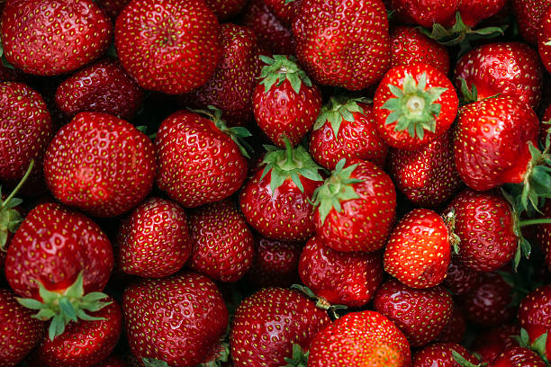 istock background from freshly harvested strawberries, directly above 543184210