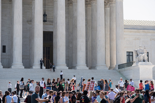 Washington DC, USA - June 27, 2016: Pro-choice supporters celebrate in front of the U.S. Supreme Court after the court, in a 5-3 ruling, struck down a Texas abortion access law.