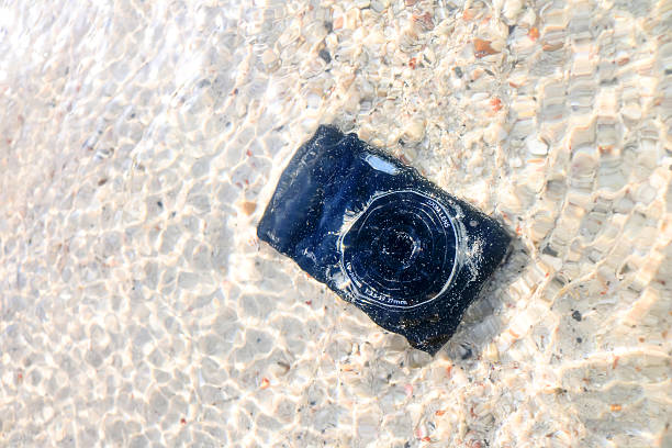istock Camera fall to the sea water 543187684