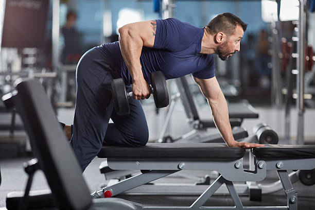 istock Dumbbell row in the gym 543189080
