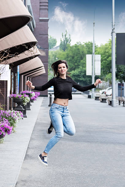 istock Jumping woman in the city 543194792