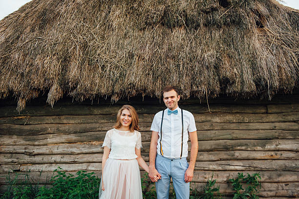 istock Happy Bride and groom walking on the green grass 543194862