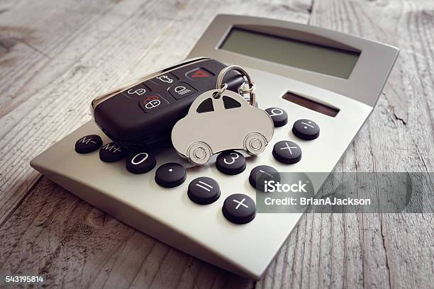 Car Shape Keyring And Key On Calculator Stock Photo - Download Image Now - Car, Financial Loan, Calculator