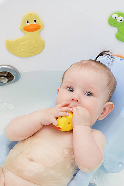 istock Newborn baby bathe and swim 543196554