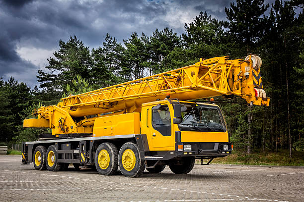 istock Yellow mobile crane in road construction 543196588