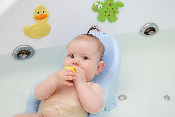 istock Newborn baby bathe and swim 543196638