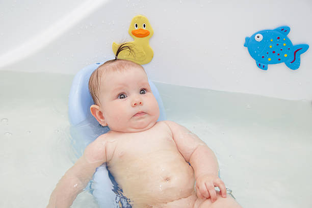 istock Newborn baby bathe and swim 543197174