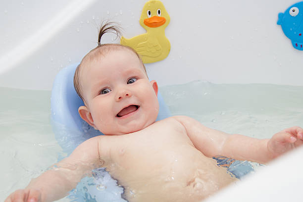 istock Newborn baby bathe and swim 543197276