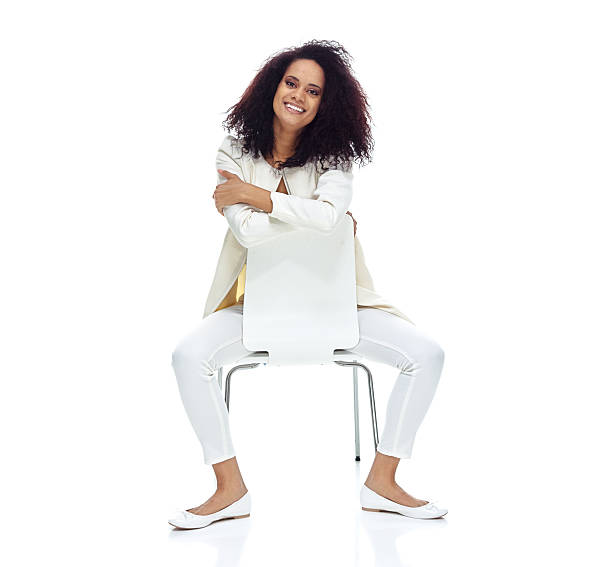 istock Cheerful woman sitting on chair 543197548