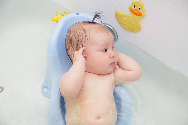 istock Newborn baby bathe and swim 543197648