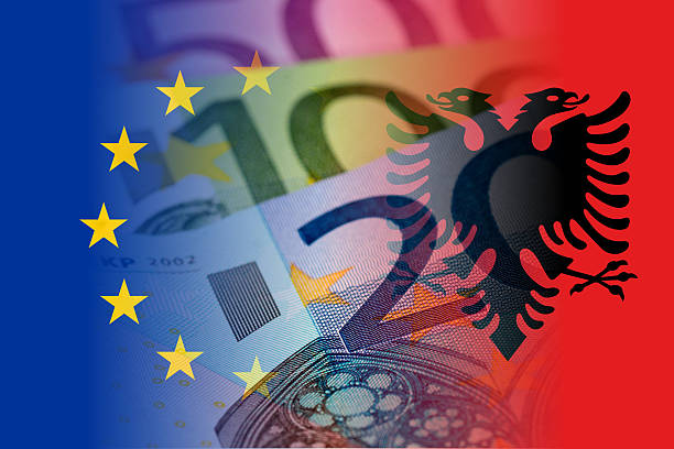 istock eu and albania flag with euro banknotes 543199632