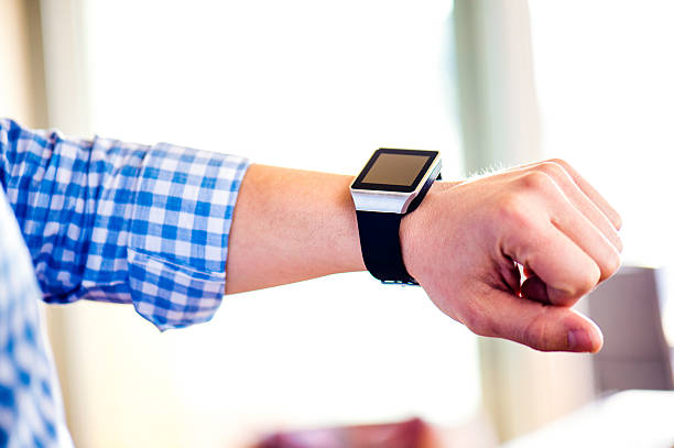 istock Close up of unrecognizable man using smart watch 543200134