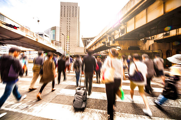 istock People crossing street in Osaka downtown 543200274