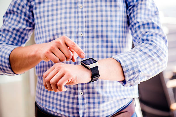 istock Close up of unrecognizable man using smart watch 543200300