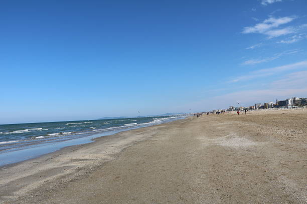 istock long and wide sandy beach under blue sky, Rimini Italy 543200734