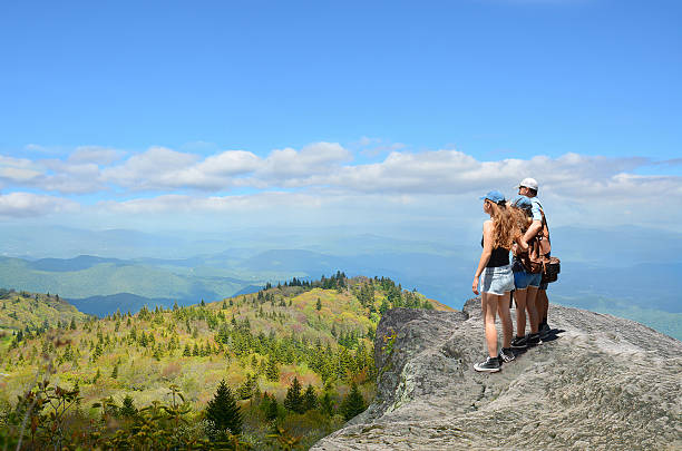 istock Family hiking in autumn mountains. 543200736