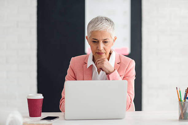 istock Mature Businesswoman Working In Her Office. 543200928