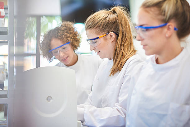 istock female scientists with centrifuge 543202394