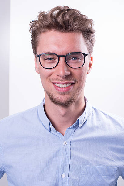 istock Portrait young smart Professional with blue shirt smiling into camera 543203802