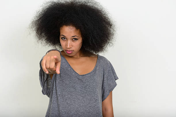 istock African woman pointing finger at you 543204478