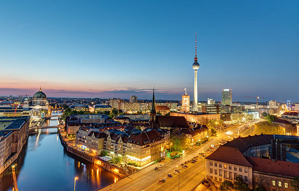 The Berlin skyline at night stock photo