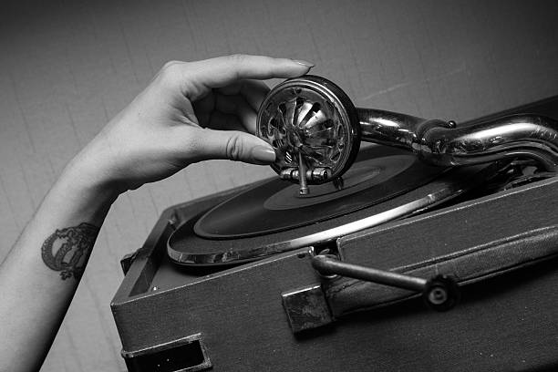 istock hand girl and gramophone 543204542