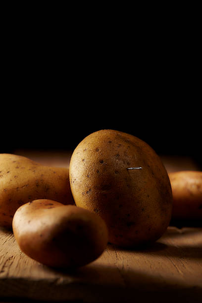 istock Food horror  - Sewing needle sticking in potato 543204702