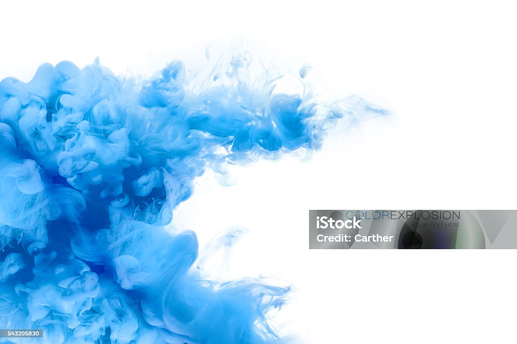 Blue Acrylic Ink in Water. Color Explosion. Paint Texture Closeup of a colorful blue acrylic ink in water isolated on white with copy space. Template design. Abstract background. Color explosion. Paint texture. Blue Stock Photo