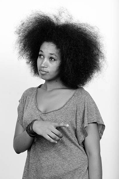 istock Bored African woman pointing finger 543206432