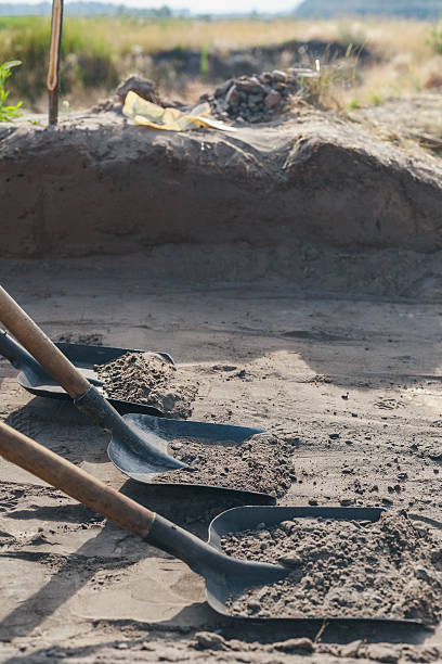 istock archaeological dig, with shovels removed thin layer of the earth 543206566