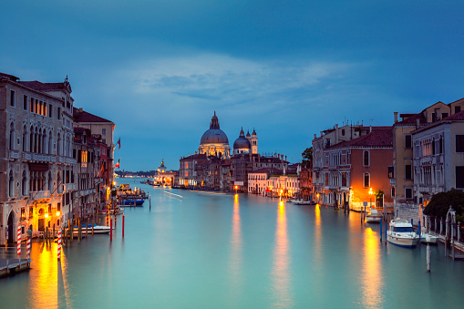 Grand Canal and Santa Maria della Salute in Venice Italy at dusk.