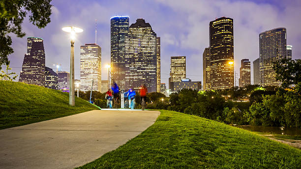 istock Houston City Skyline at Night & People in Park 543209576