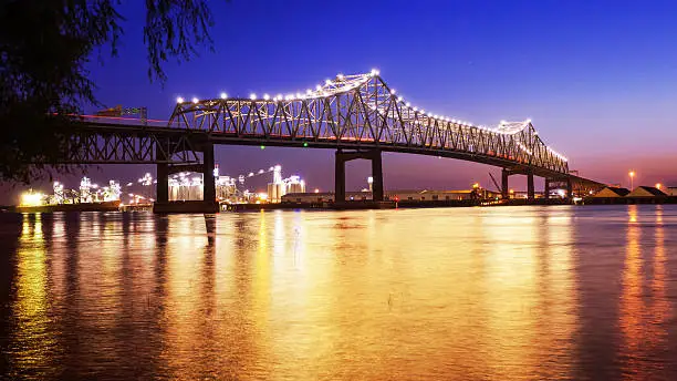 Horace Wilkinson Bridge crosses over the Mississippi River at night in Baton Rouge, Louisiana