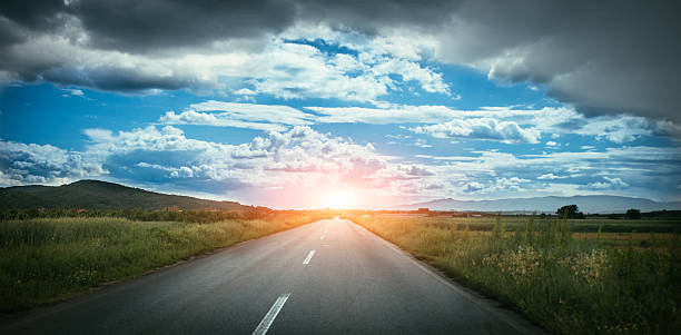 istock Travel concept background - road and stormy sky 543210958