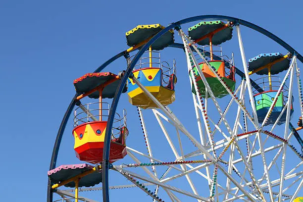 A small ferris wheel at a seaside amusement park in Scarborough, England