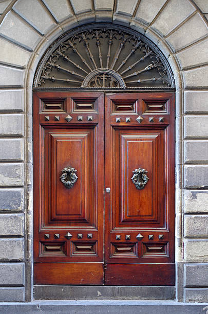 ancient wooden door of historic building - stone textured italian culture textured effect imagens e fotografias de stock