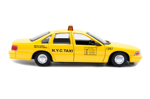 Izmir, Turkey - May 25, 2016: Toy N.Y.C. Taxi close up image on isolated white background.