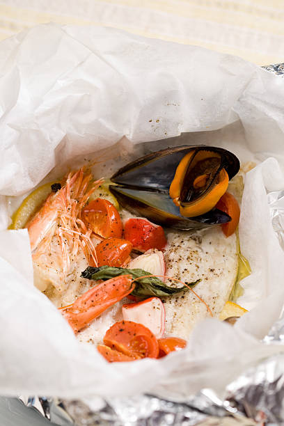 istock Roasted seafood in aluminium foil 543212510