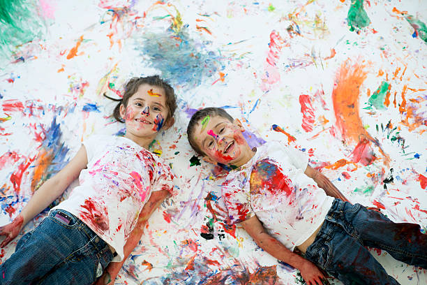 istock Children Lying on Their Creative Painting 543214148