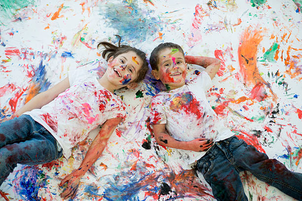 istock Messy Children After Finger Painting 543214150
