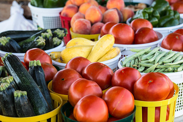 Tomatoes, Zucchini, Squash, Green Beans, Peaches at Farmers Mark stock photo