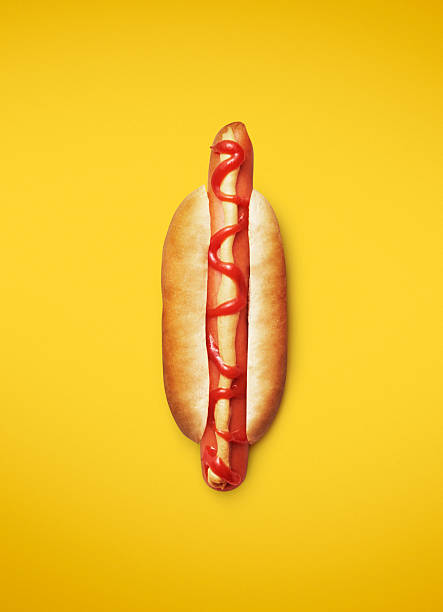 Close up of yellow mustard and red sweet chili sauce on barbecue hot dog, Mastercard Creative,