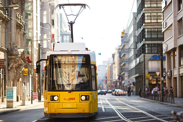 Yellow tram in Berlin Mitte, Germany. Tramway public transport stock photo