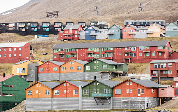 istock Multicolored houses on hillside with coal tramway, Longyearbyen, Spitsbergen 543218318