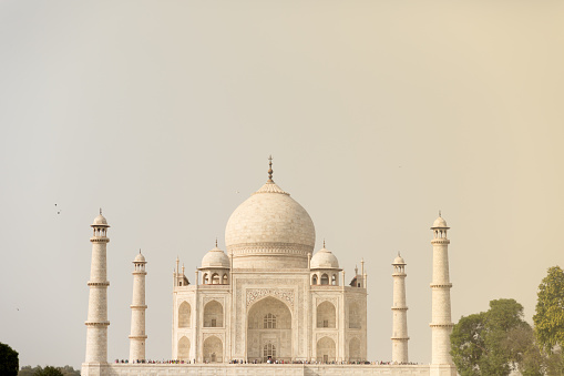 A glimpse at the top portion of the magnificent Taj Mahal, situated in the city of Agra, on a sunny Spring day.