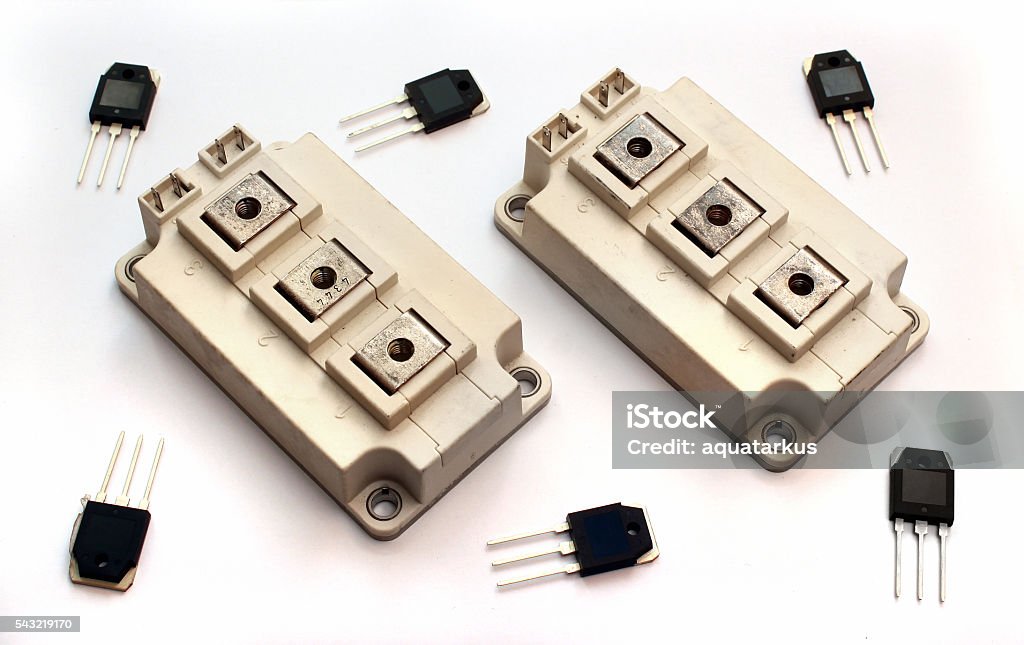 Powerful Igbt Transistors Isolated On White Background Stock Photo -  Download Image Now - iStock