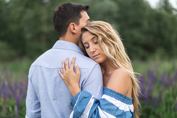 istock loving couple embracing each other in nature 543219554