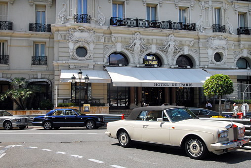 Monaco, France - May 7, 2008: Luxury cars parked outside Hotel de Paris, 5 star luxury hotel. The hotel was seen in two James Bond films, Never Say Never Again (an un- official film) and GoldenEye