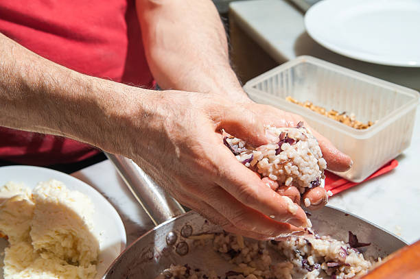 istock The making of sicilian arancini 543316808