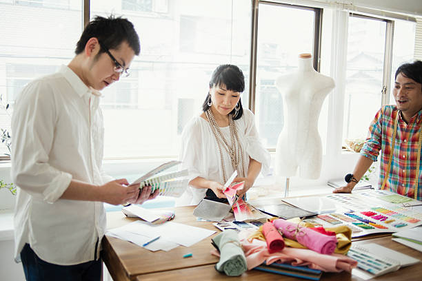 istock Fashion designers working in studio 543319152